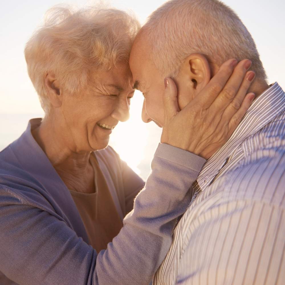 An older couple sharing a quiet moment at home